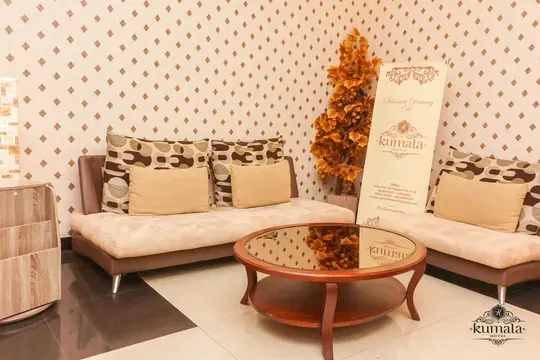 Bright guest hallways and modern elevator doors leading to upper rooms